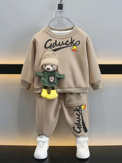 A boy's round-neck hoodie and long pants set, paired with cute bear accessories, is soft and comfortable. It is suitable for casual outdoor wear, especially for autumn and winter, and for school, Perfect for Outdoor