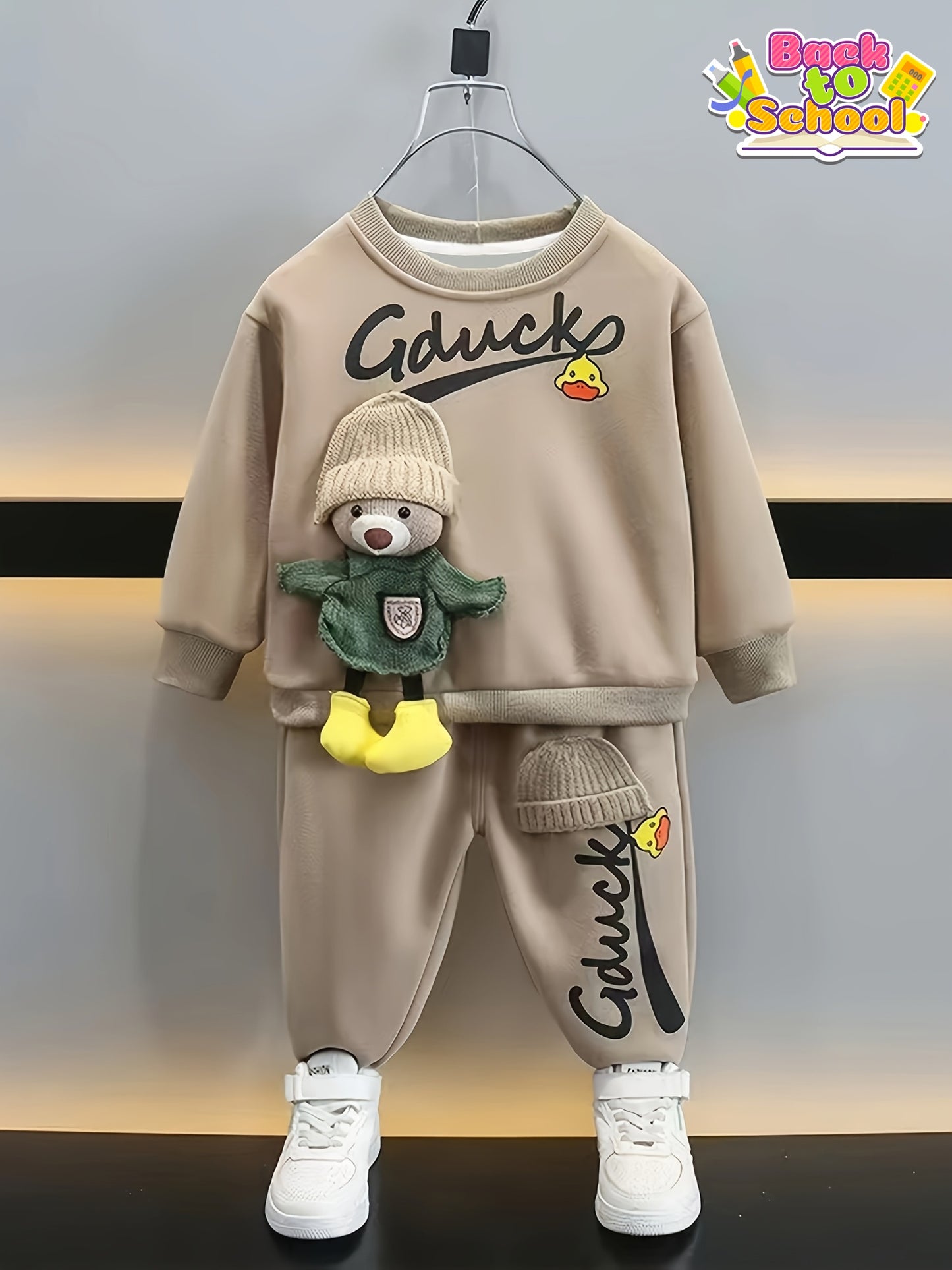 A boy's round-neck hoodie and long pants set, paired with cute bear accessories, is soft and comfortable. It is suitable for casual outdoor wear, especially for autumn and winter, and for school, Perfect for Outdoor