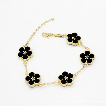 18k vergulde bloemenarmbanden